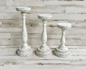 Rustic distressed wooden pillar candle holder set